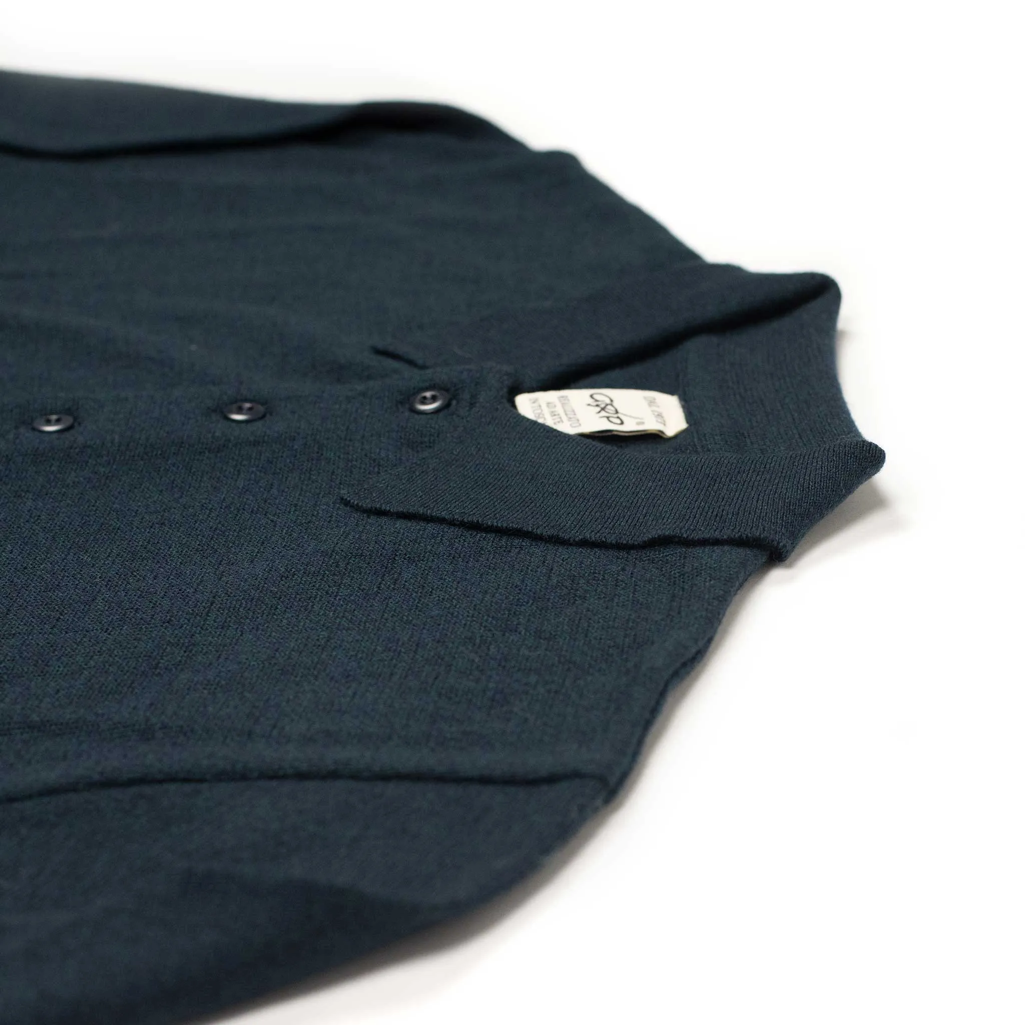 Knit long sleeve polo in petrol melange merino wool